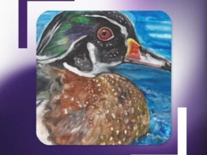 a close up of a wood duck coaster